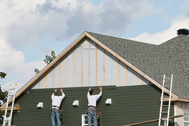 Professional Siding technician working in Central, TN